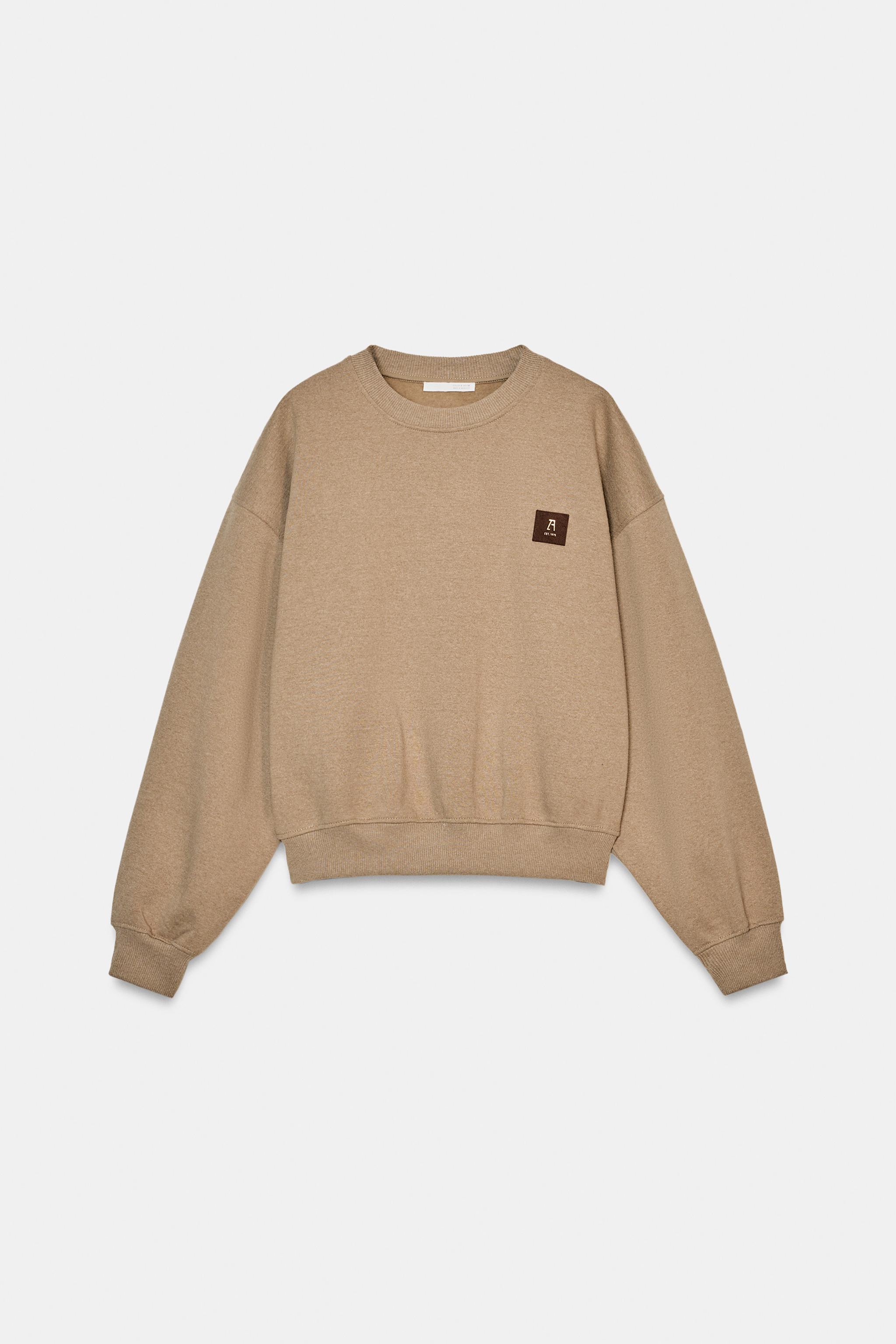 SWEAT AVEC PIÈCE